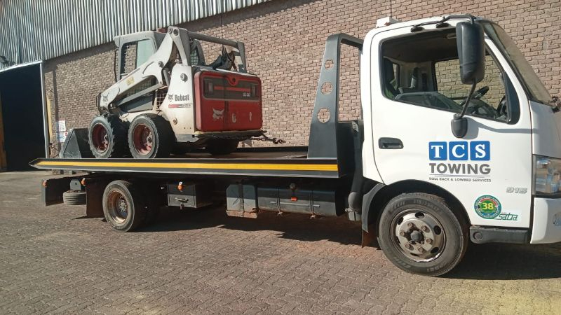 Bobcat skid‑steer transported nationwide